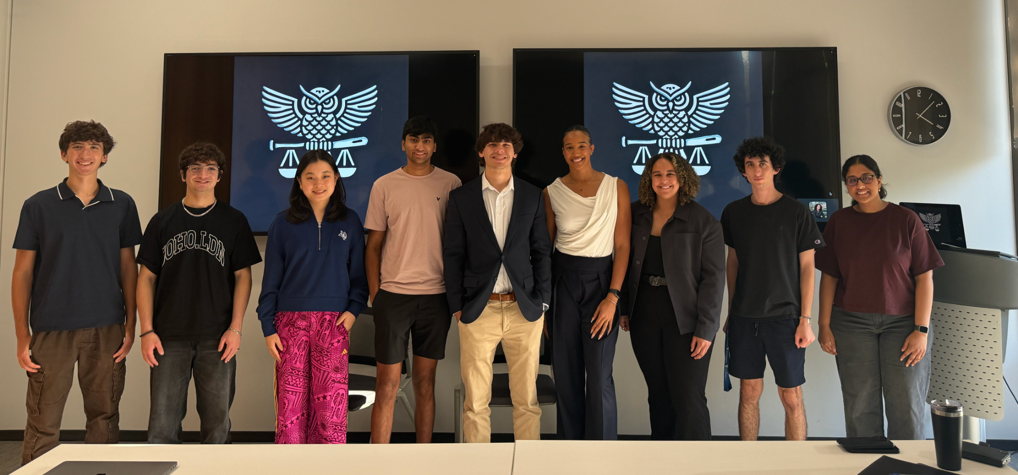Rice Sport Law Society members gathered in front of the RSLS mark